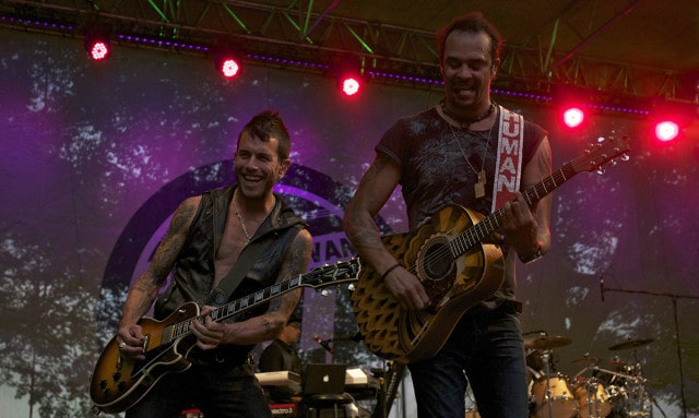 Michael Franti (right) and guitarist Jay Bowman rocking the opening night of the Saskatchewan Jazz Festival.