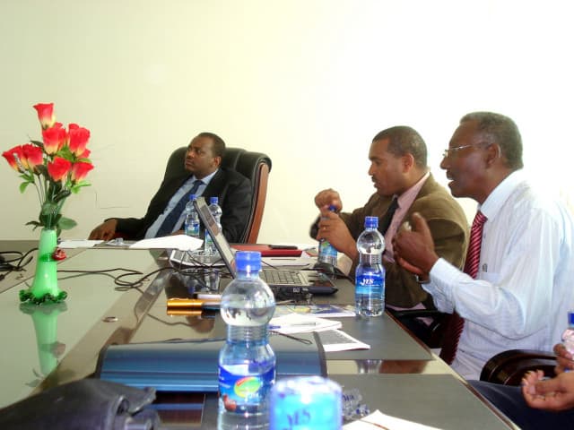 Shiferaw Shigute, left, watches a presentation from the International Livestock Research Institute on Sept. 16, 2011 alongside other officials from Ethiopia's southern region. The location of the photo is unknown.